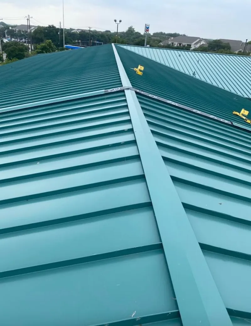 Green commercial metal roof ridge and valley for Metal Roof Repair in Raleigh Hills